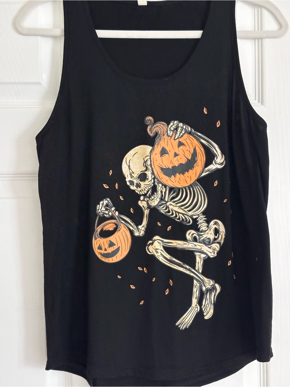 Halloween 👻 
the Pumpkin" Tank Top from the brand Seventh.Ink, Women’s Black